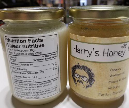 image of glass jars of honey